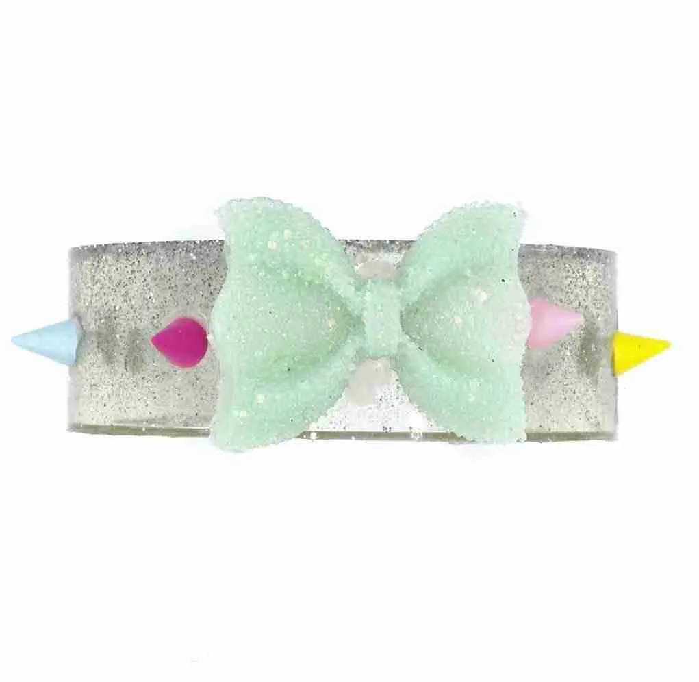 Glitter and Gloom Resin Cuff With Bow